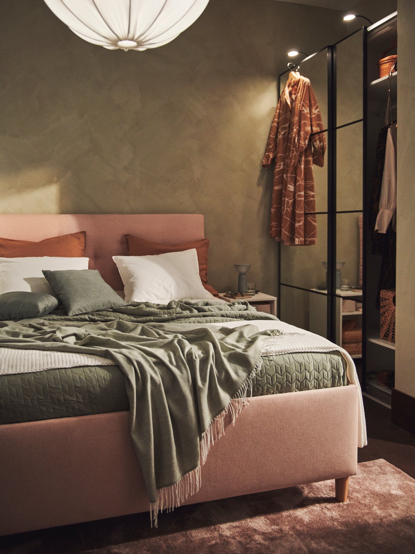 A light grey-green HOLMVI throw