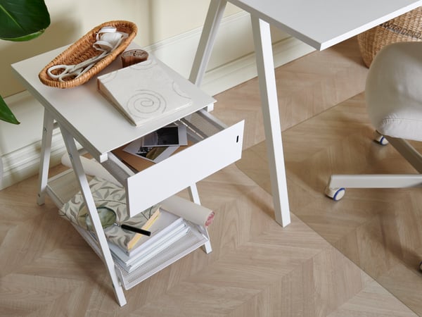 A white TROTTEN drawer unit in the home office