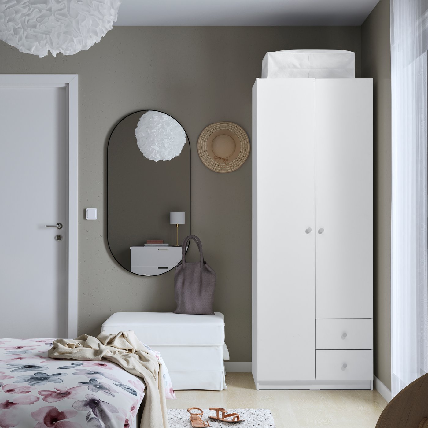 A white BRUKSVARA wardrobe with 2 doors and 2 drawers