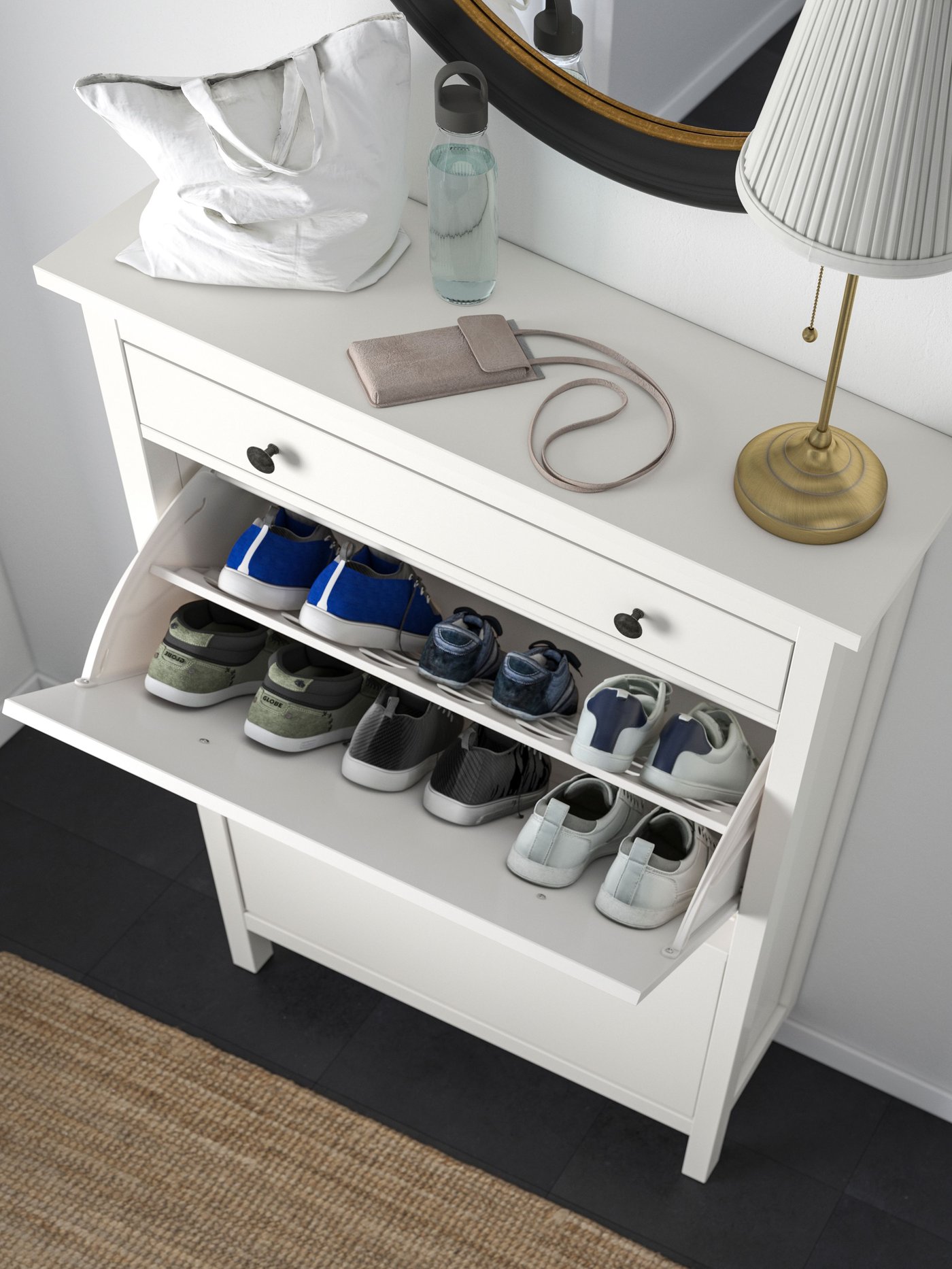 A white HEMNES shoe cabinet with 2 compartments