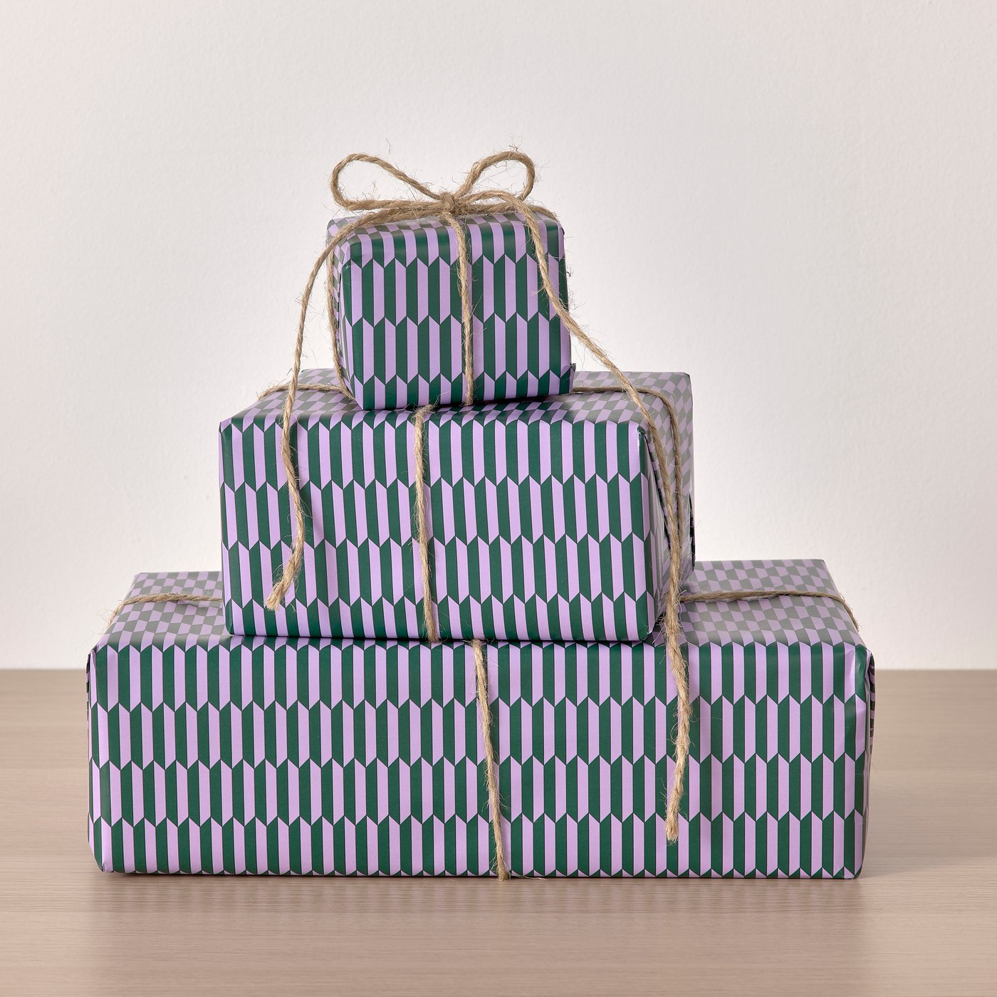 A lilac/dark green-blue PURKEN gift wrap roll