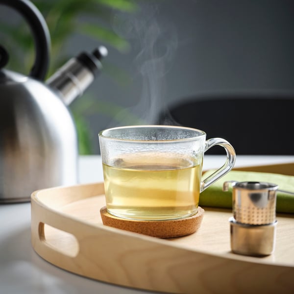 A clear glass IKEA 365+ mug