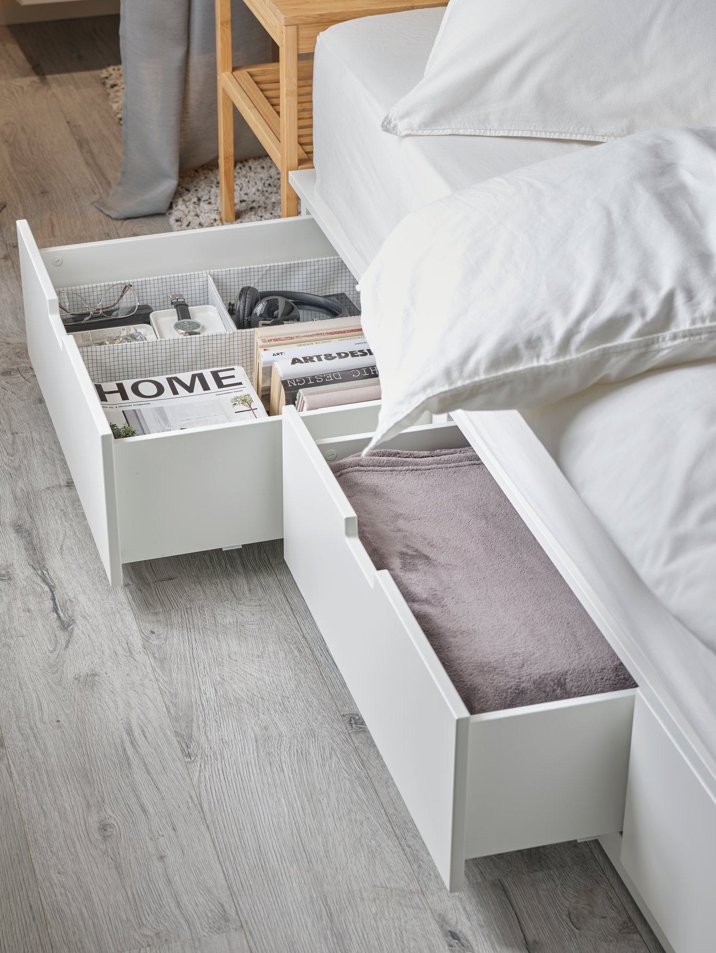 A white/grey STUK box with compartments in the bedroom