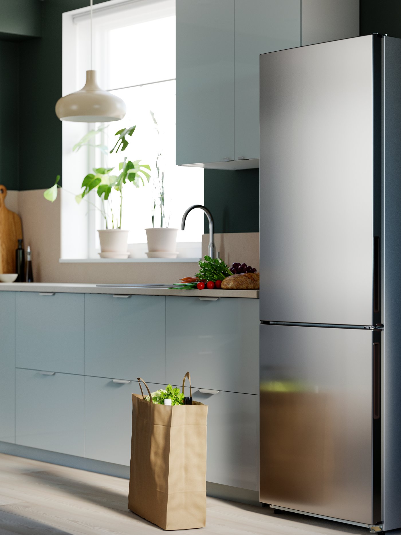 An IKEA 500 freestanding/stainless steel MEDGÅNG fridge/freezer