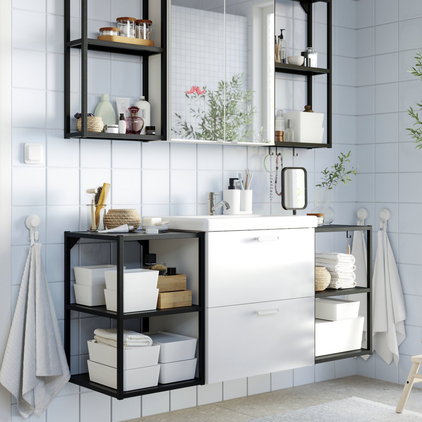 A black LINDBYN table mirror in the bathroom