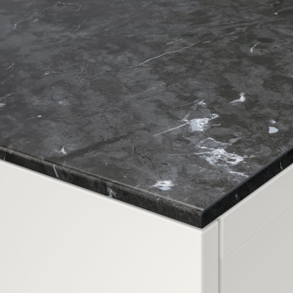 A marble effect/black BESTÅ top panel in the NA