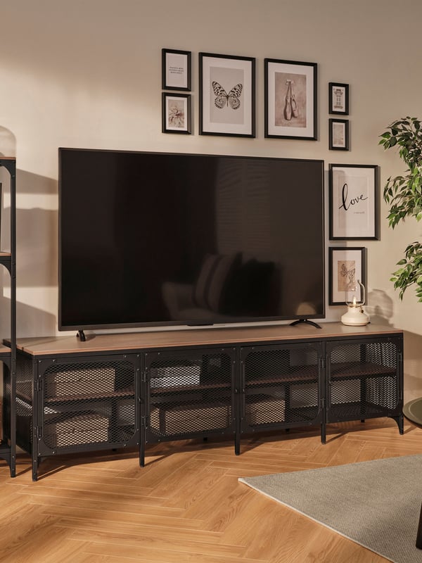 A black FJÄLLBO TV bench