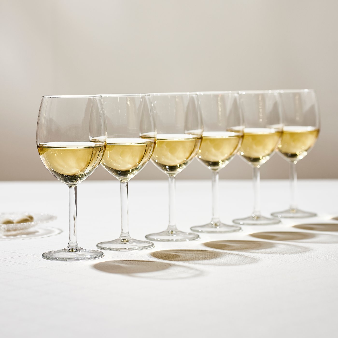 A clear glass SVALKA wine glass