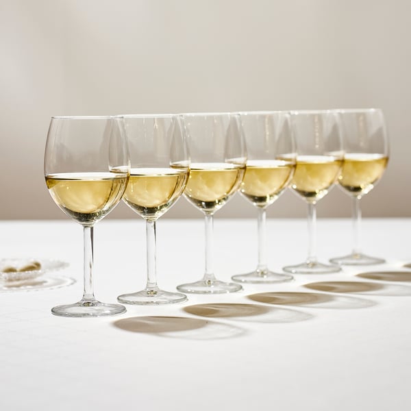 A clear glass SVALKA wine glass