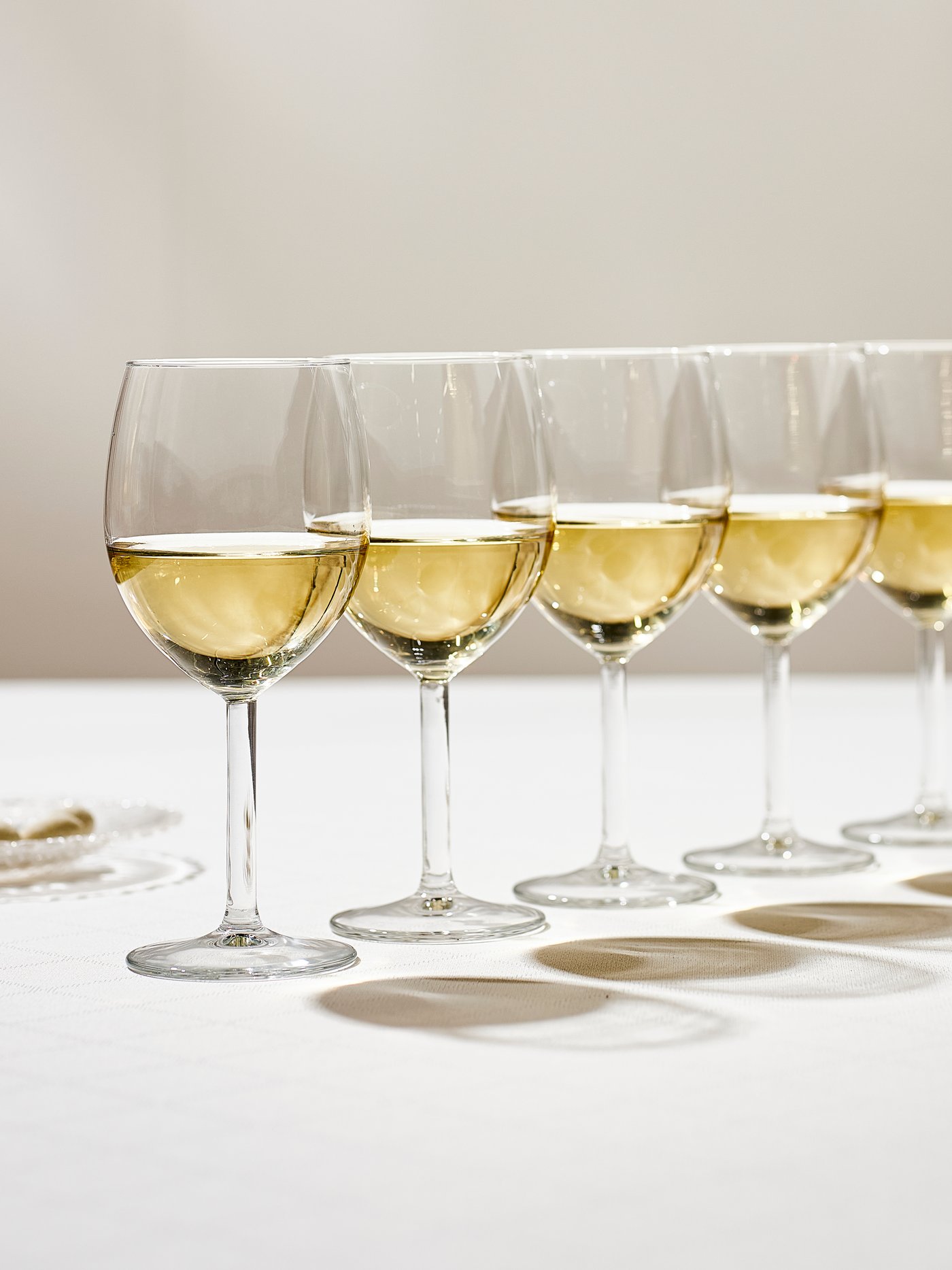 A clear glass SVALKA wine glass
