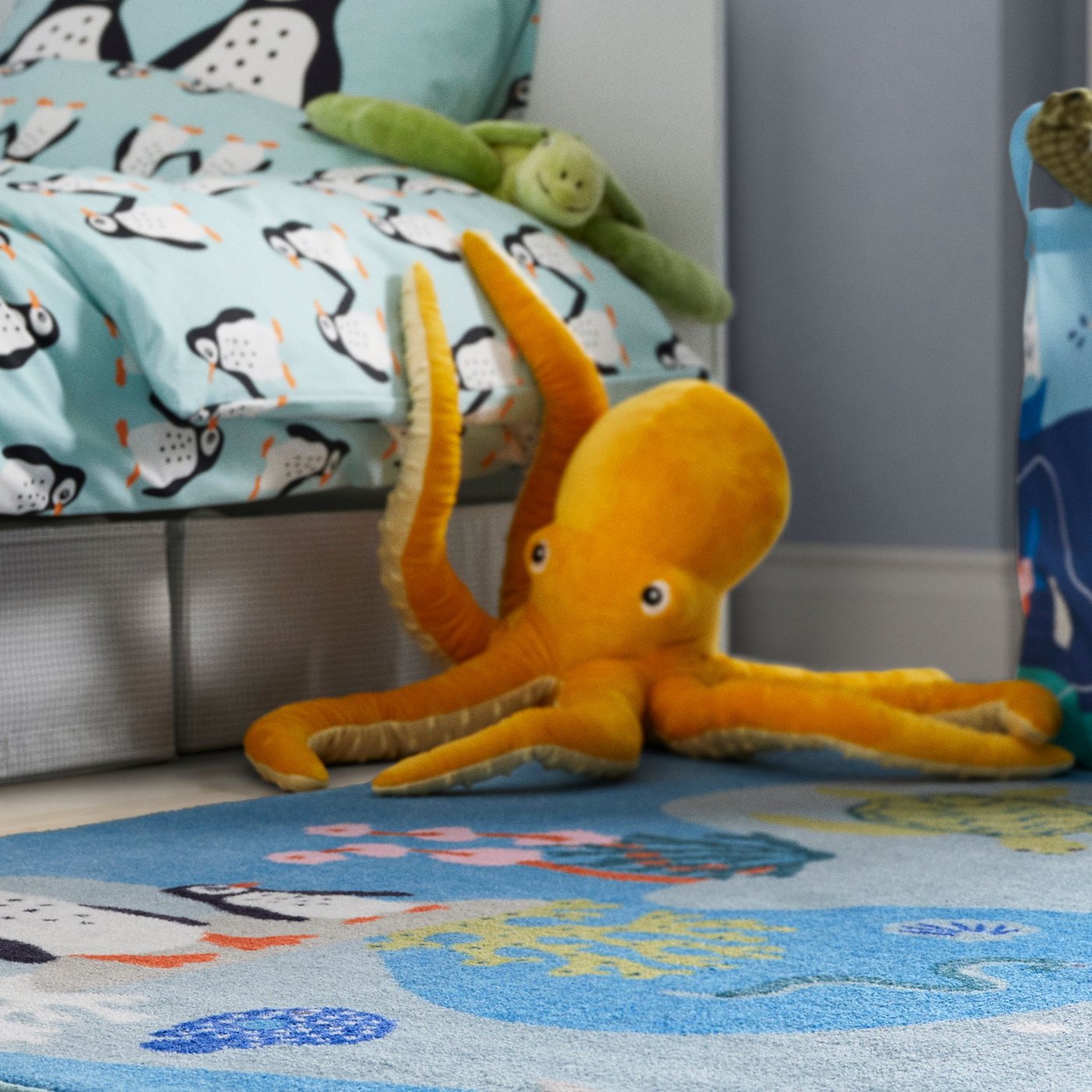 An octopus/yellow BLÅVINGAD soft toy