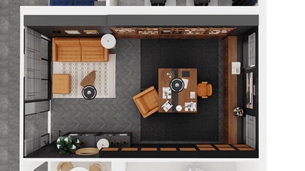 Grundriss eines Büros aus der Vogelperspektive. Links Ruhebereich mit einem Sofa, einem Sessel und einem Couchtisch, sowie gegenüberliegenden Aufbewahrungsmöbeln. Rechts ein großer  Schreibtisch mit einem Bürostuhl und enem Besucherstuhl. Rechts und links vom Schreibtisch, sowie dahinter Bücherregale und andere Aufbewahrung.
