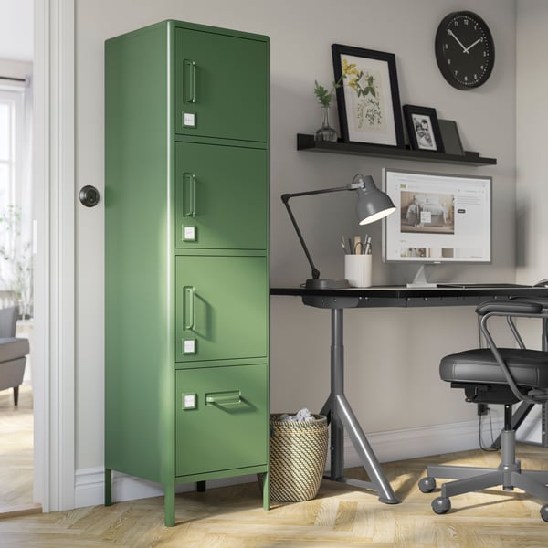 A dark green IDÅSEN high cabinet with drawer and doors