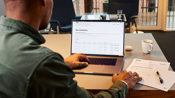 An IKEA Business Network member is viewing an open shopping list on their laptop in their office. 