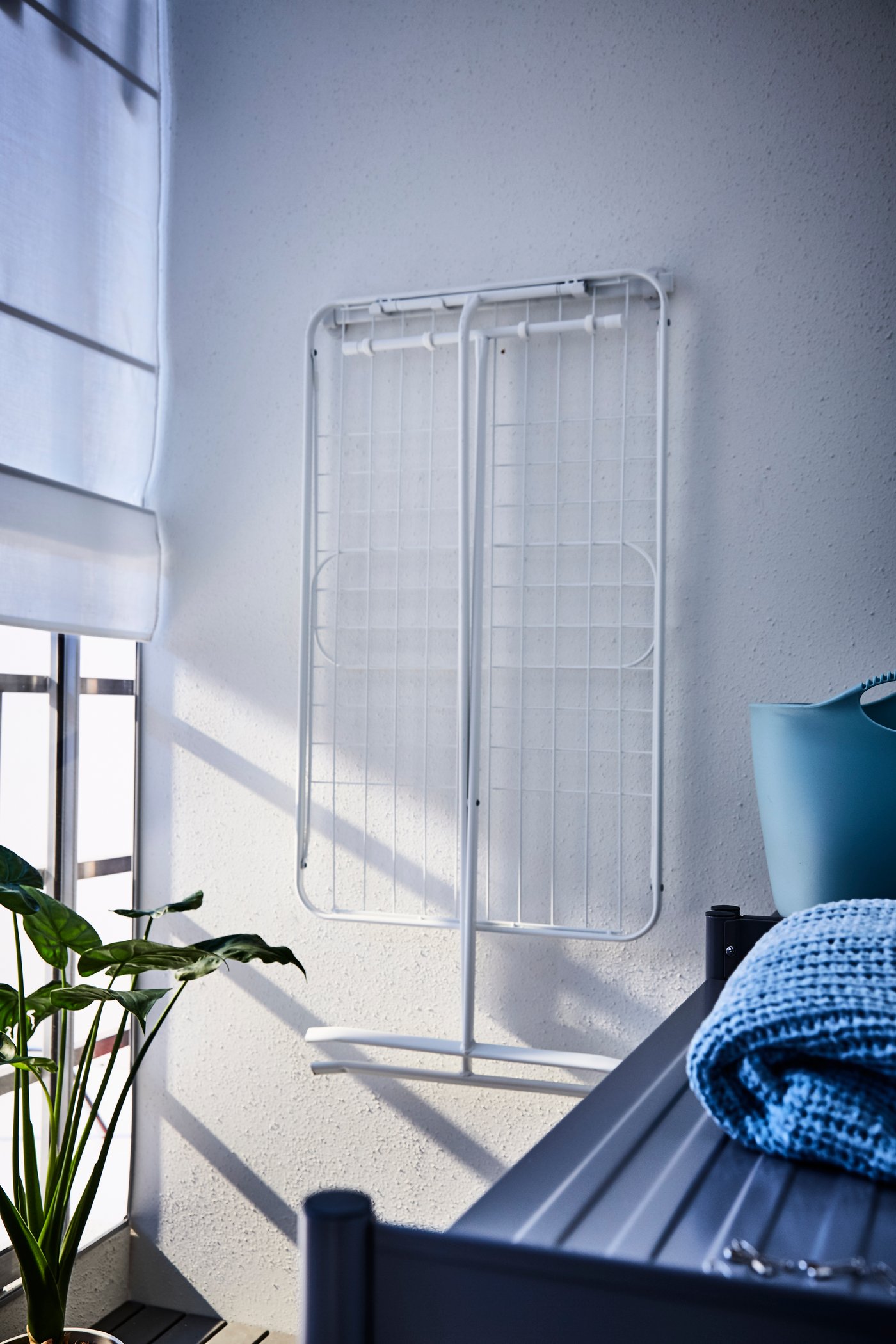 A white MULIG drying rack, in/outdoor