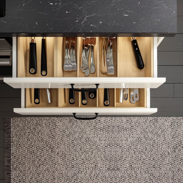 Kitchen drawers open, utensils organized in bamboo UPPDATERA organizers