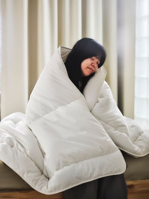 A SKOGSFRÄKEN duvet, light warm in the bedroom