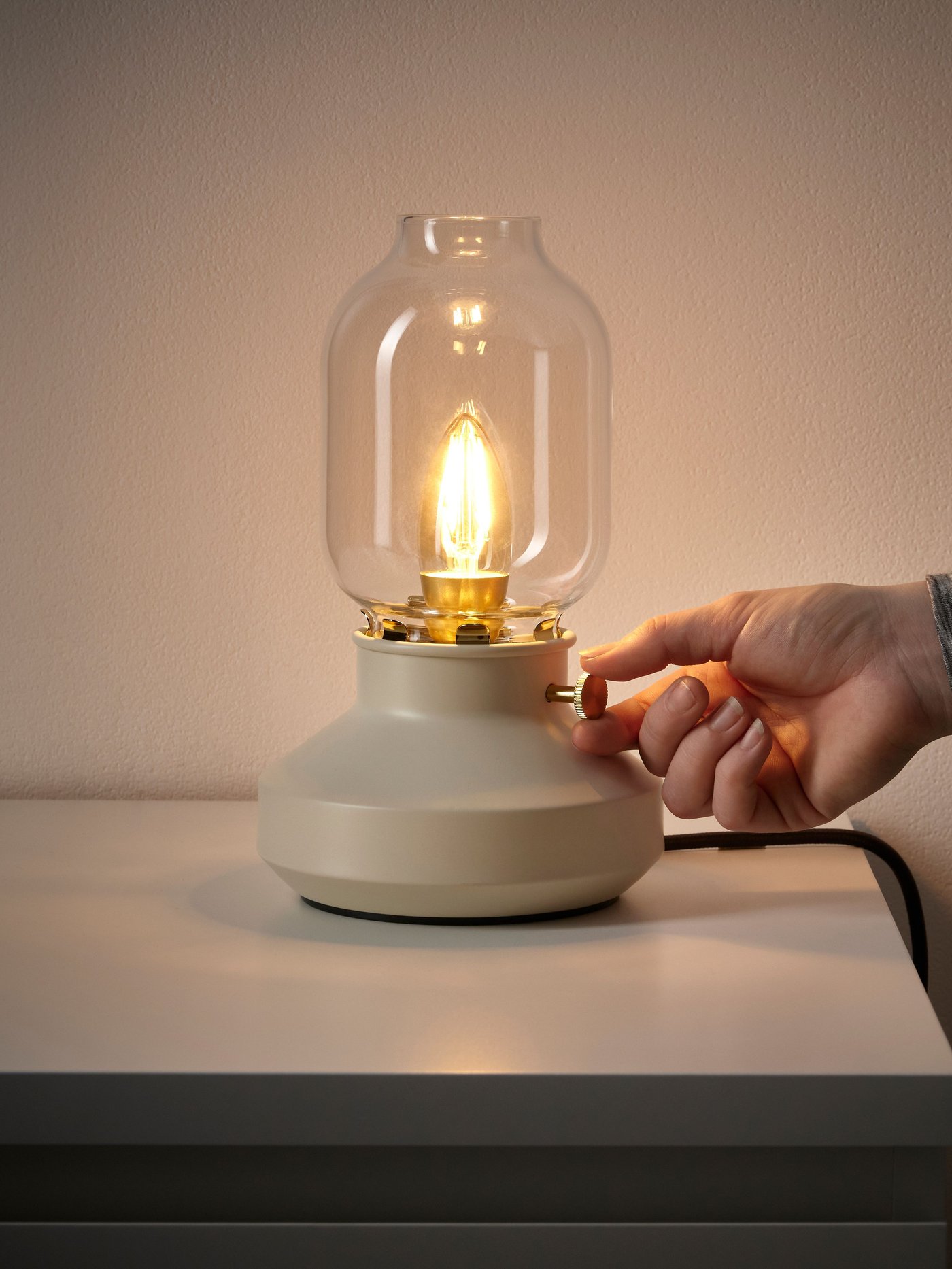 A dimmable beige TÄRNABY table lamp