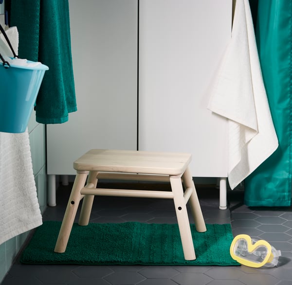 a stool in a bathroom