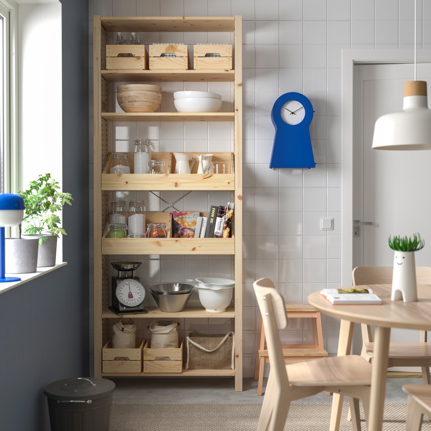 A with 2 box shelves/pine IVAR shelving unit in the dining room
