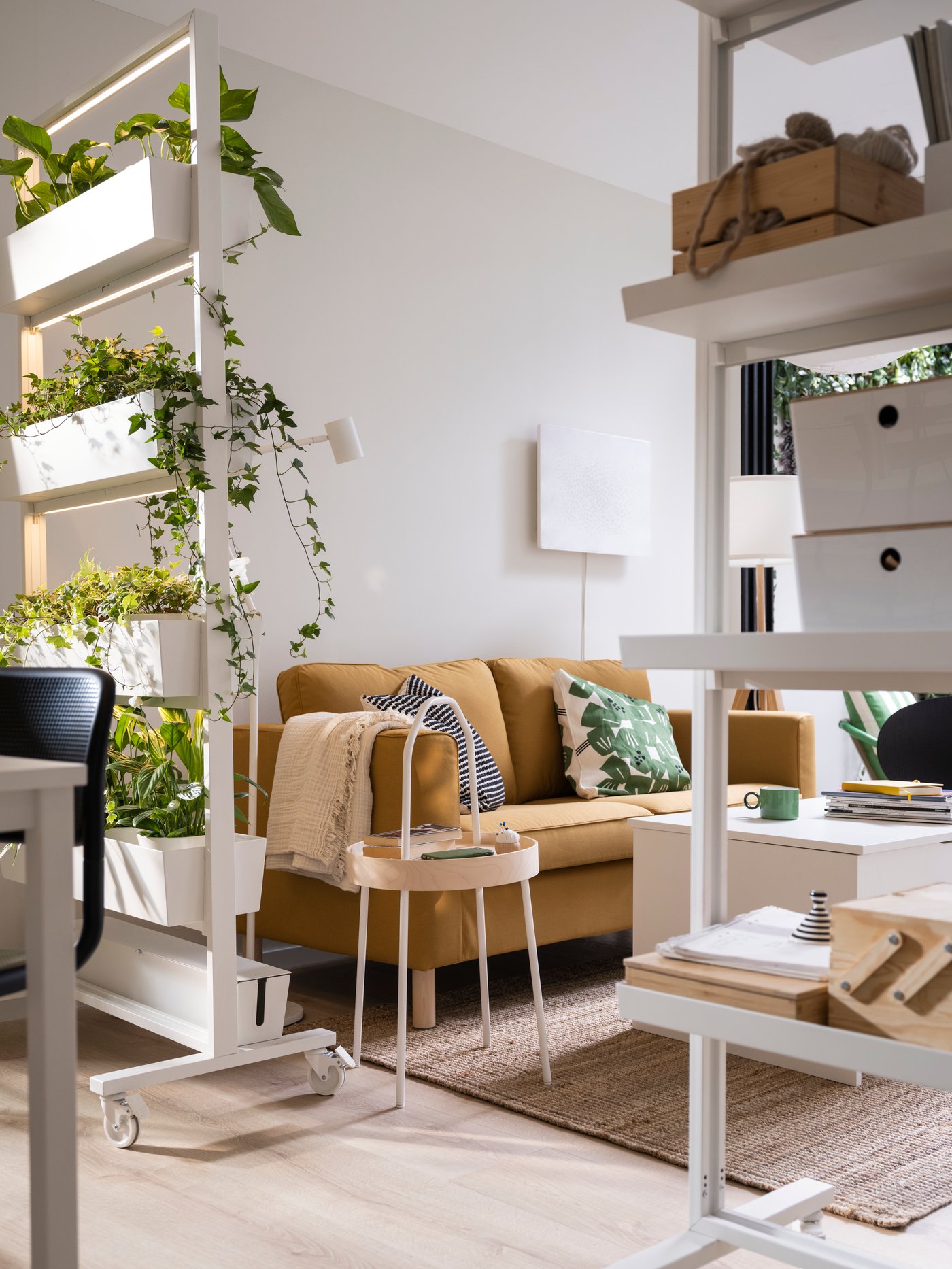 A white/green UNDERBLOMMA cushion cover