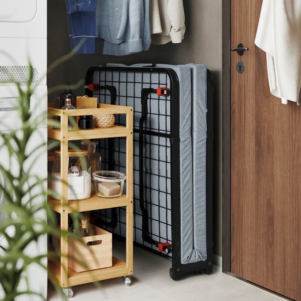 A black NORRUDDEN guest bed