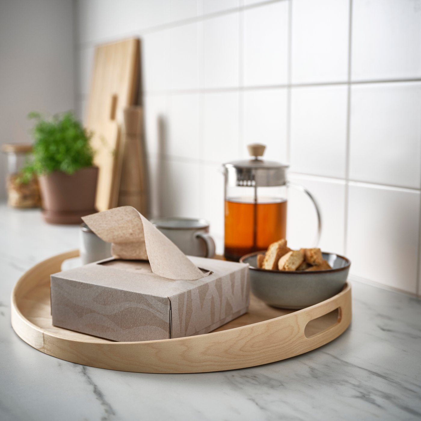 A patterned white/light beige KRUSTISTEL paper napkin