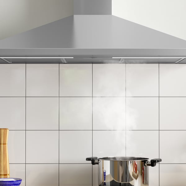A stainless steel RYTMISK wall mounted extractor hood