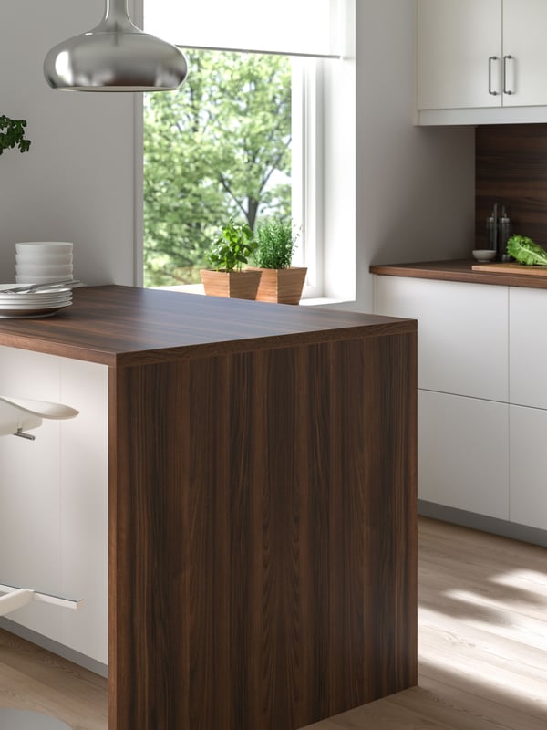 A brown walnut effect/laminate EKBACKEN worktop