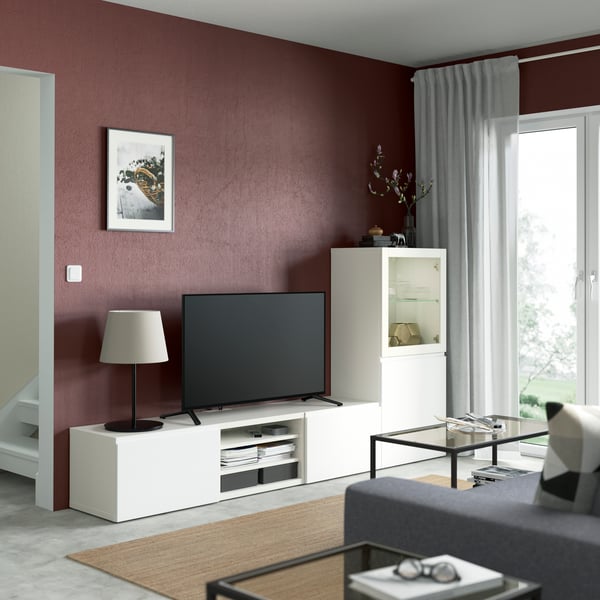 A white/Västerviken white clear glass BESTÅ TV storage combination/glass doors