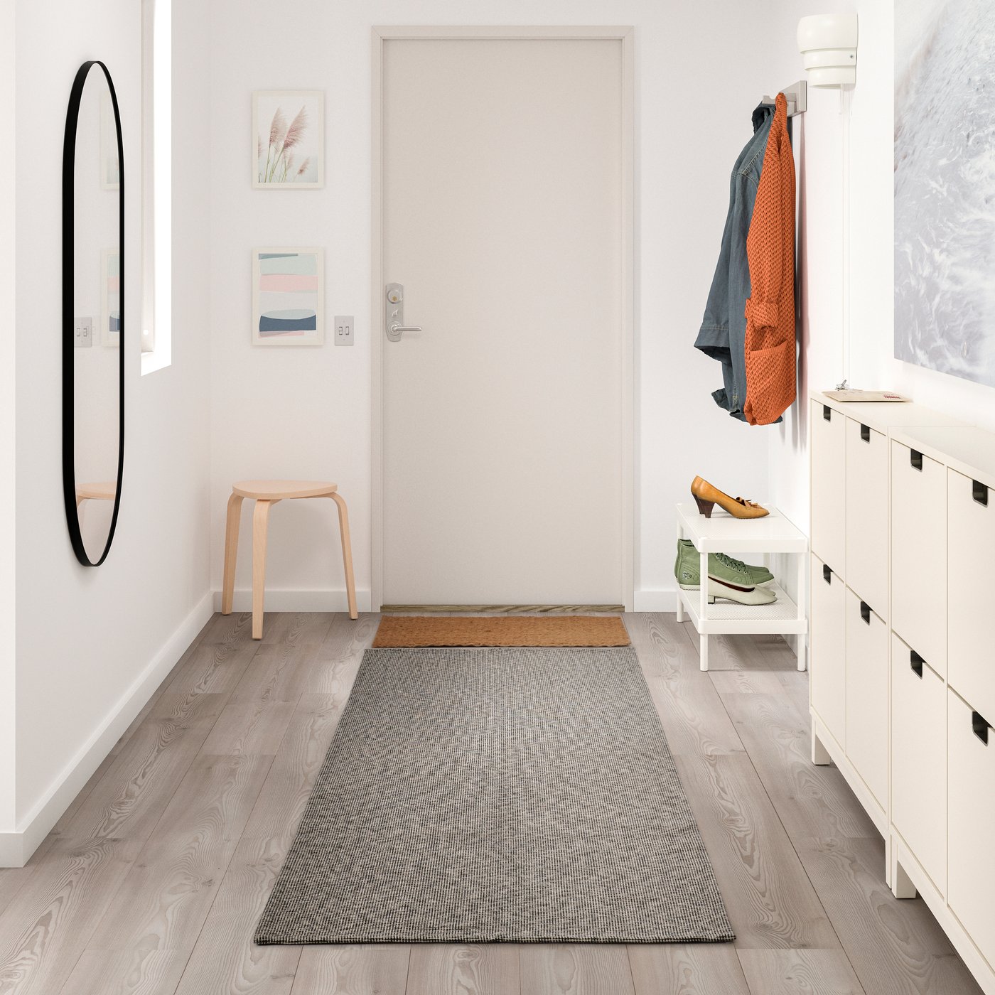 A black/natural TIPHEDE rug, flatwoven