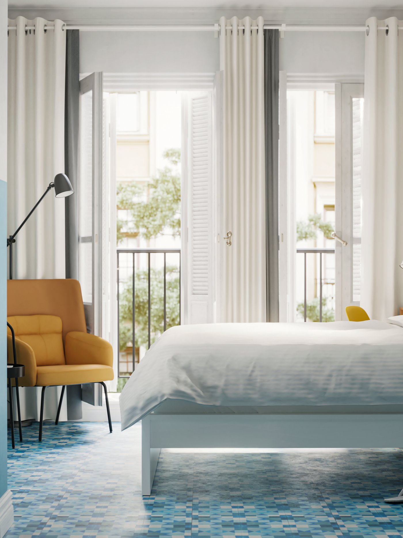 A MALM bed frame with NATTJASMIN duvet cover and pillowcases is near open balcony doors in a blue and white hotel room.