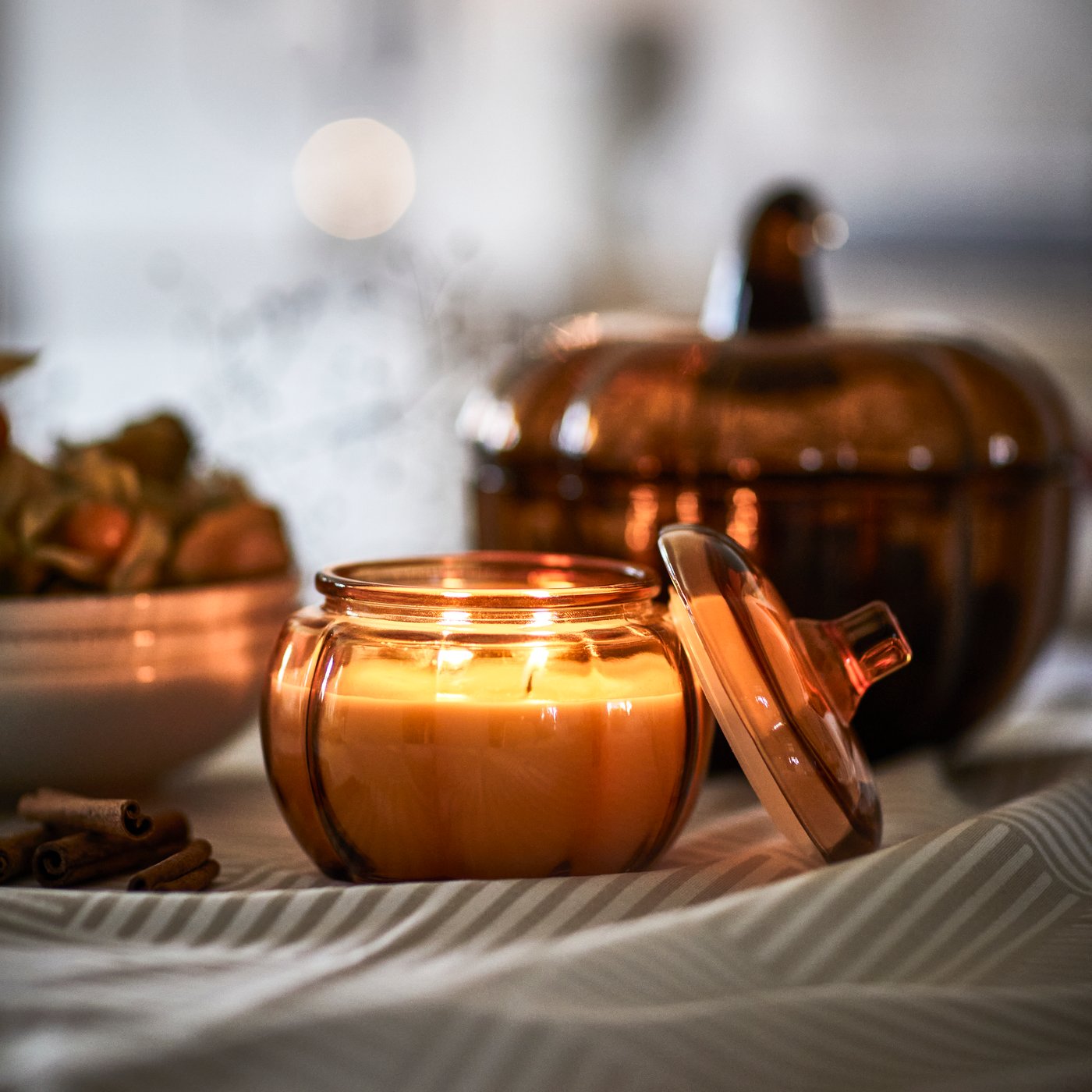 A Spiced pumpkin/brown HÖSTAGILLE scented candle in glass