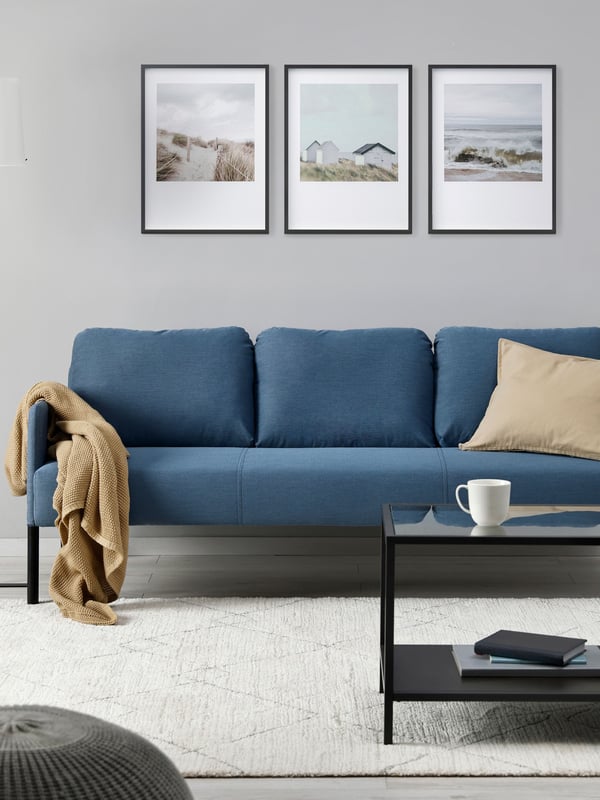 A Knisa medium blue GLOSTAD 3-seat sofa