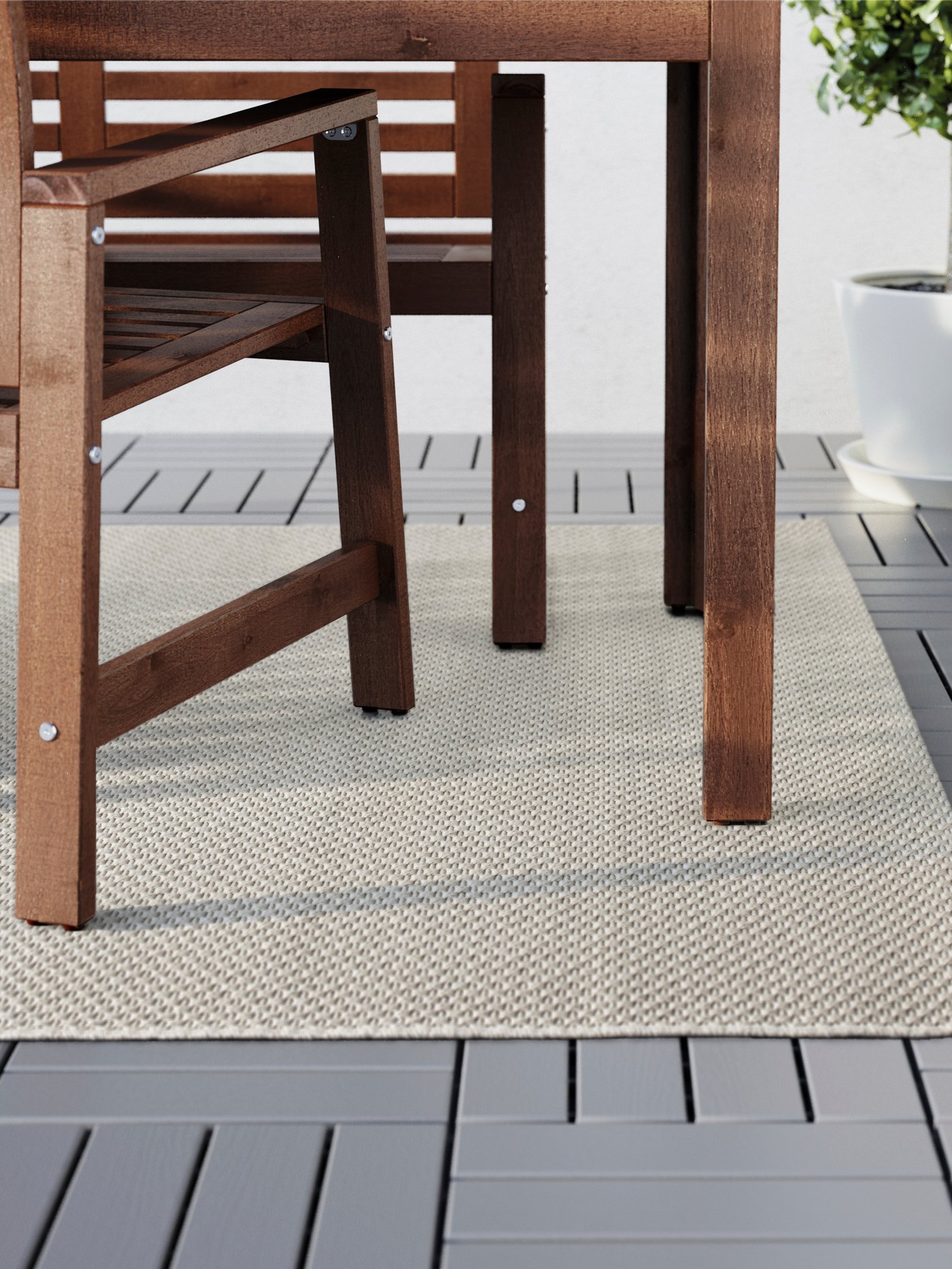 A beige MORUM rug flatwoven, in/outdoor