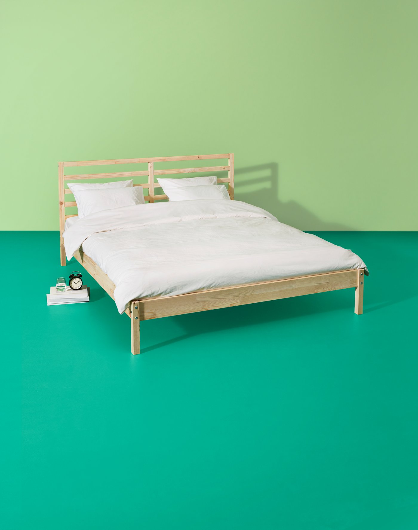 A pine TARVA bed frame