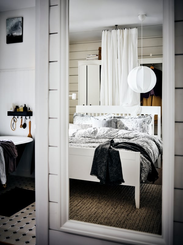A round white REGNSKUR pendant lampshade