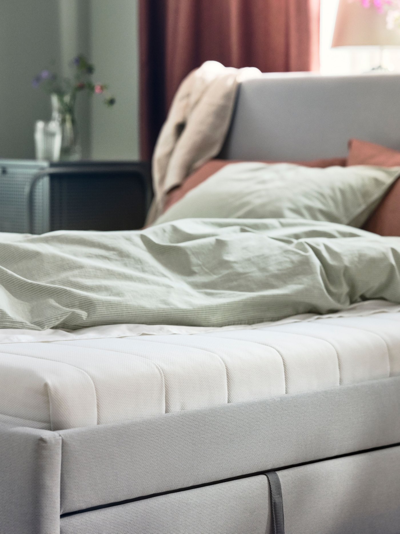 A medium firm/white ÅFJÄLL foam mattress