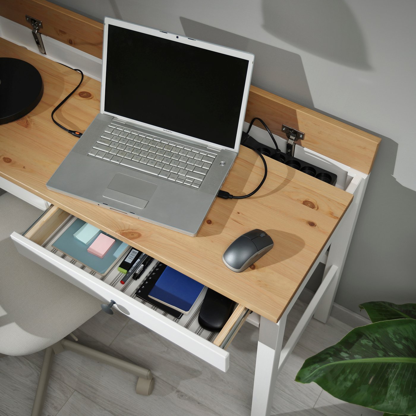 A white stain/light brown HEMNES desk with 2 drawers