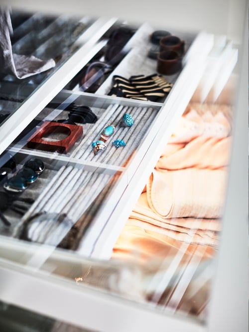Bedroom with wardrobe, shelve, drawer with glass door, scarves, jewellery, folded clothes, inset for jewellery, pull-out tray.