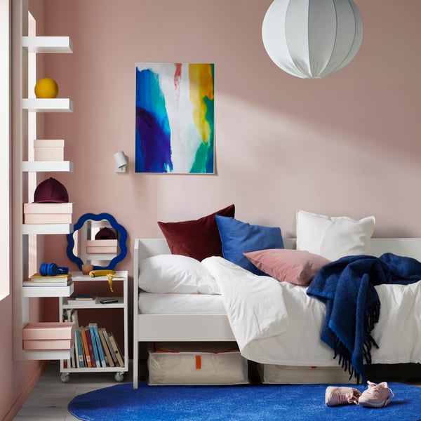 A white VIHALS day-bed frame