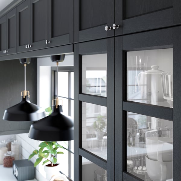 A black stained LERHYTTAN glass door in the kitchen
