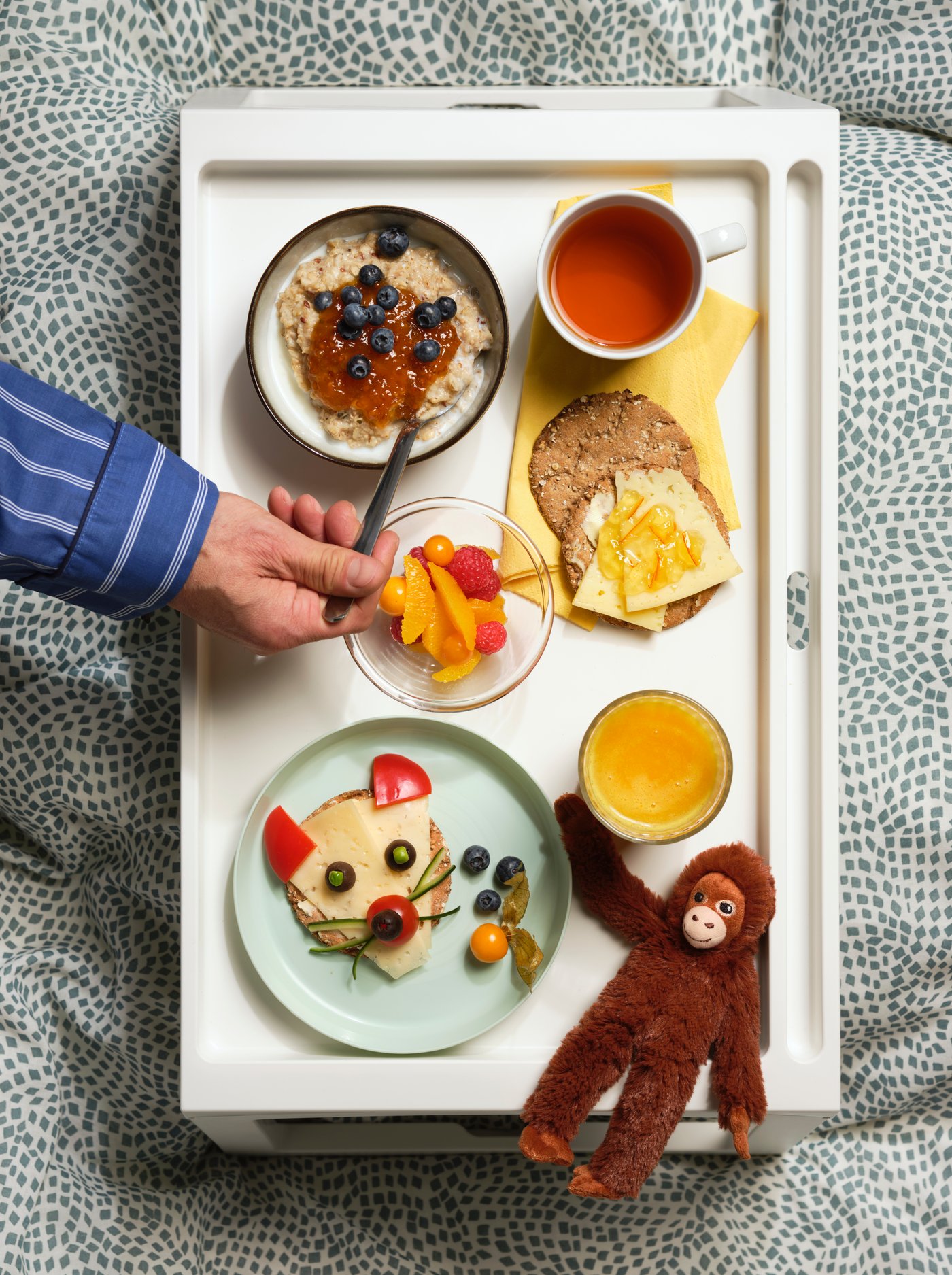 A white/blue TRÄDKRASSULA duvet cover and pillowcase