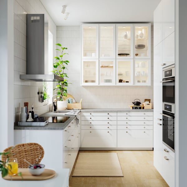 A white/clear glass HEJSTA glass door in the kitchen
