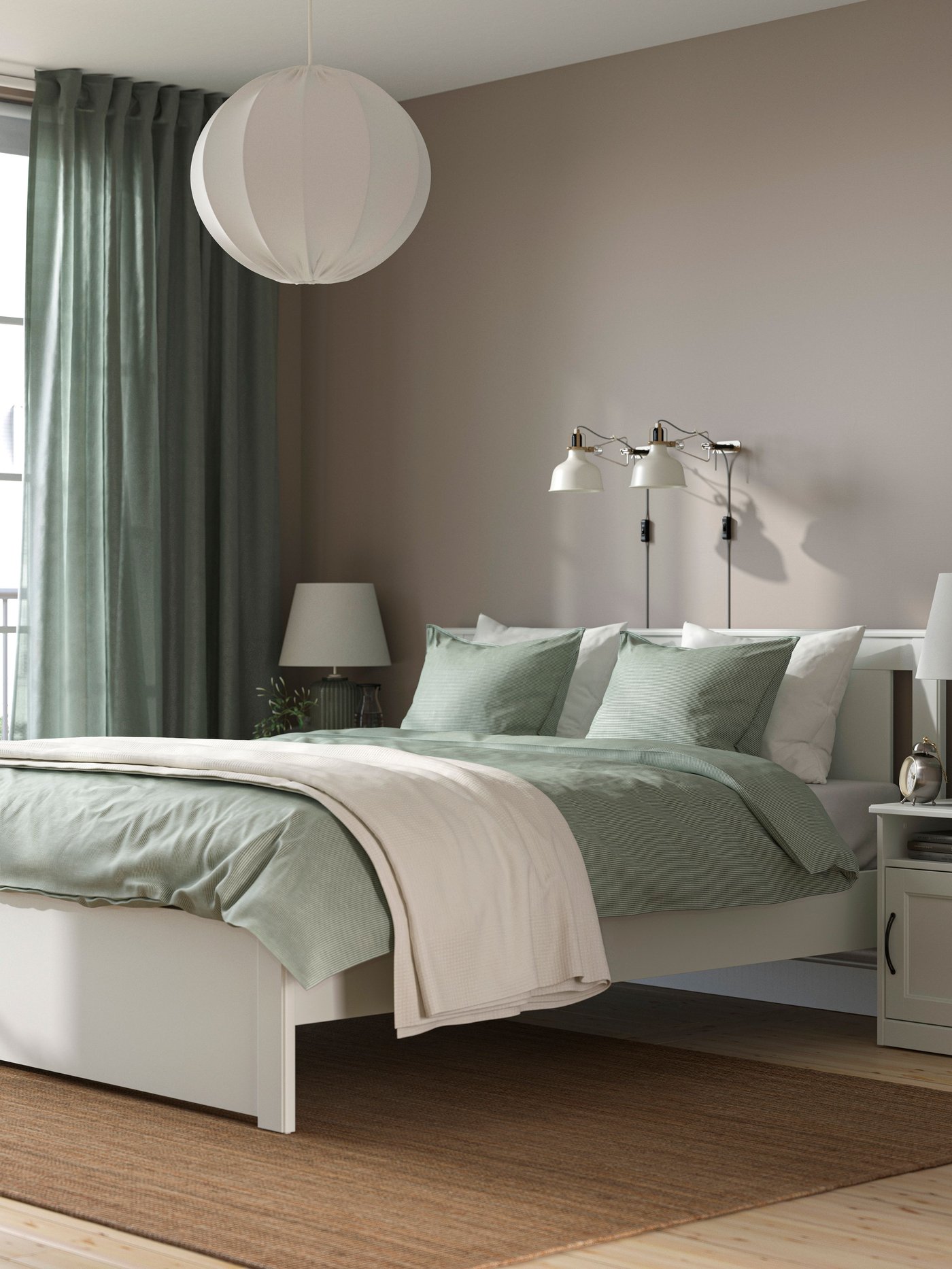 A white SONGESAND bed frame