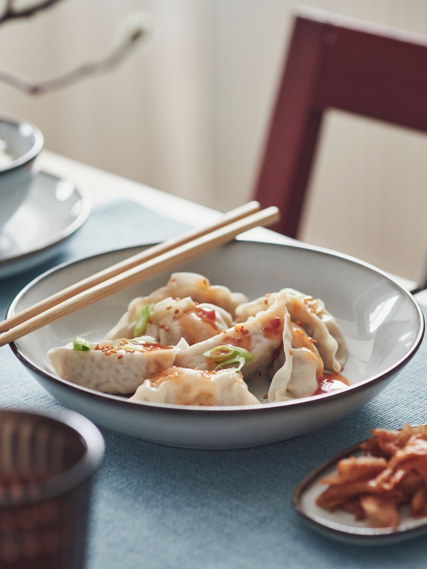 A grey GLADELIG deep plate