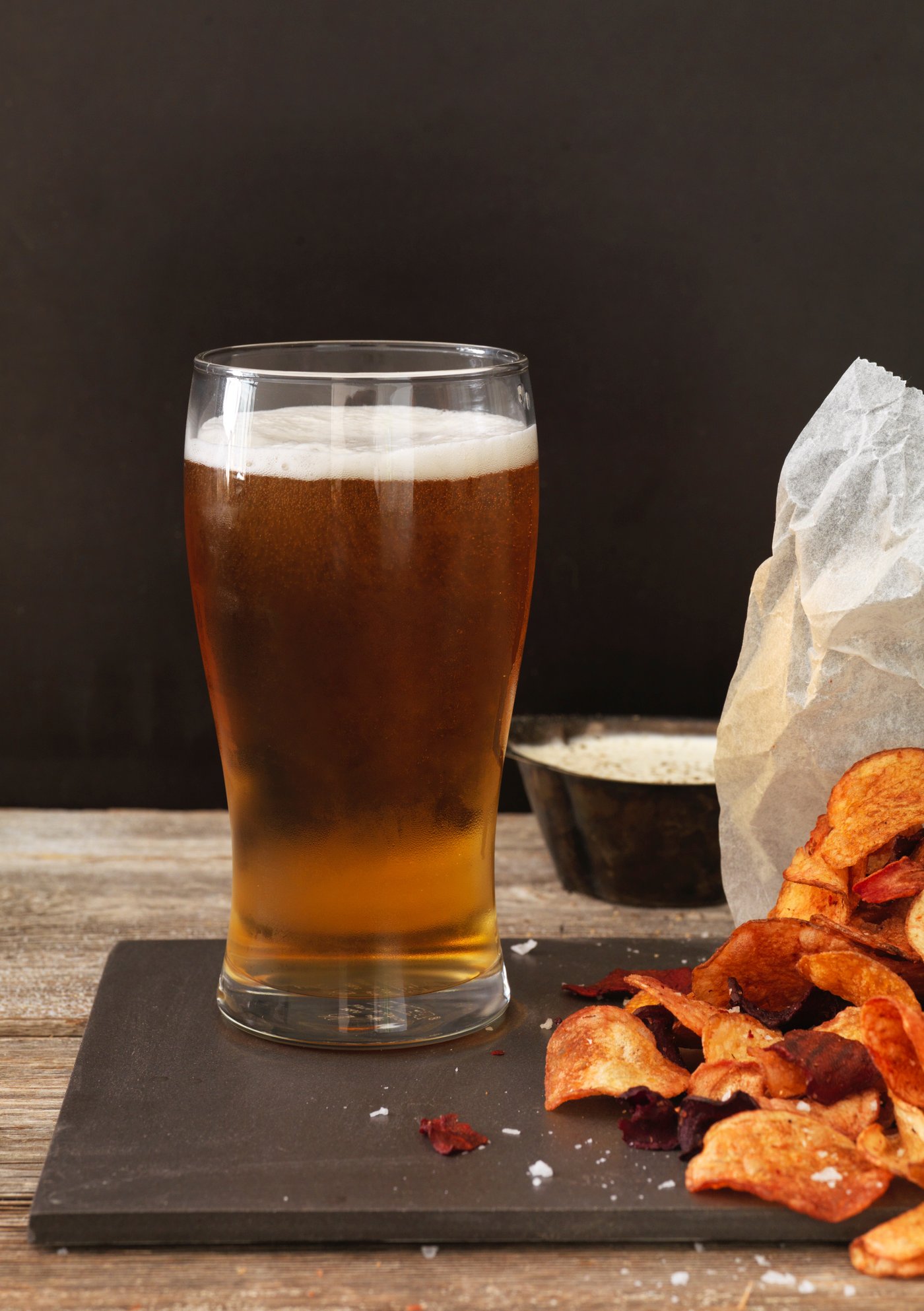 A clear glass LODRÄT beer glass
