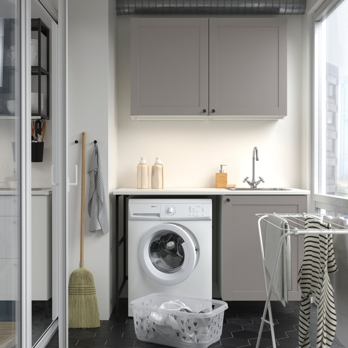 An anthracite/grey frame ENHET laundry in the laundry room