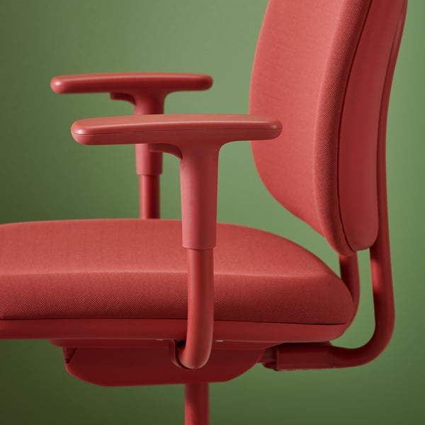 A Gräsnäs red SMÖRKULL office chair with armrests