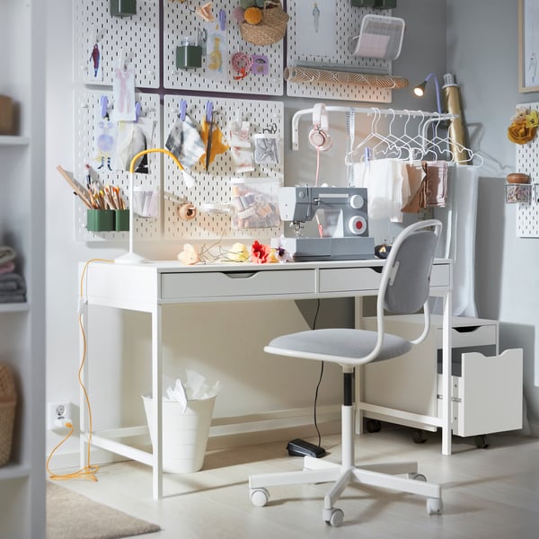 A white/black ALEX drawer unit on castors